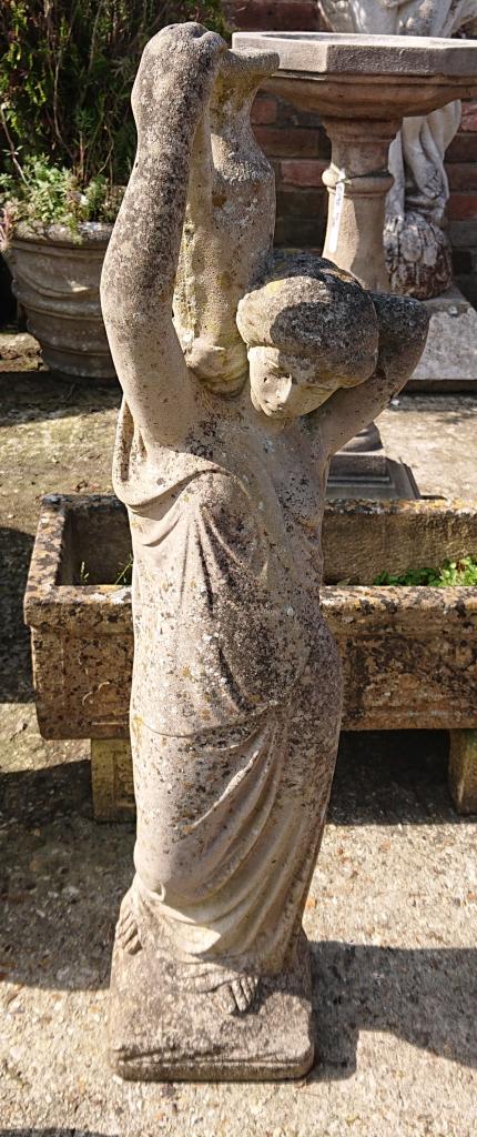 <p>Weathered Lady holding Jug Statue</p><p>92 cm tall</p>